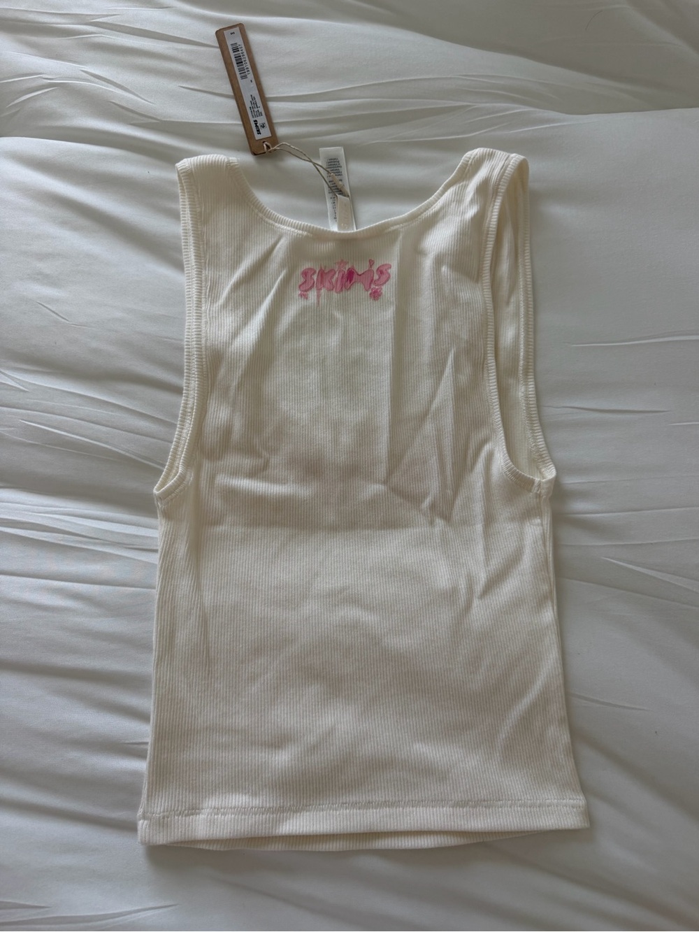 SKIMS Cream Ribbed Tank with Pink Floral Logo - Picture 2 of 3